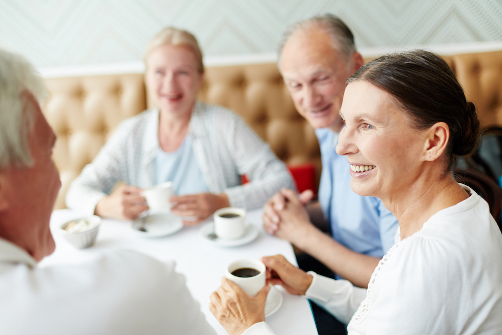 four people eating brunch at a restaurant